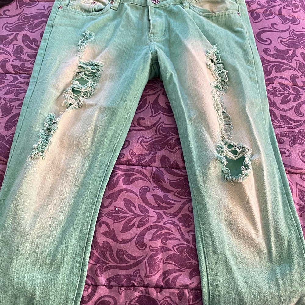 Light green jeans.